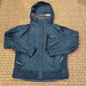 REI size XS (6-7) Rain Jacket blue hood
